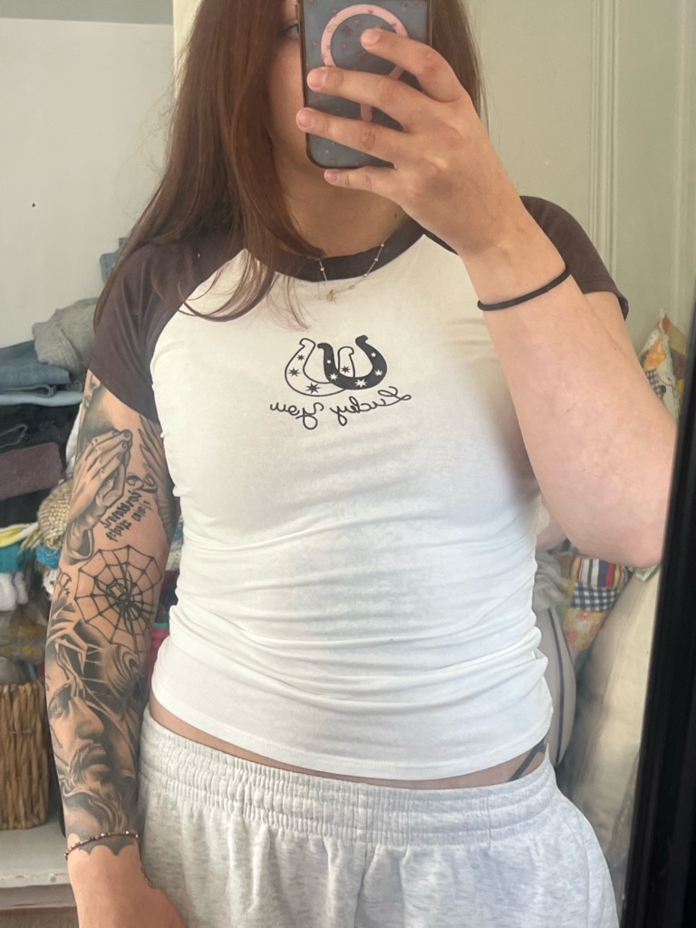 Woman’s size medium brown and white lucky you horseshoe tee